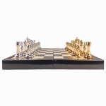 Gilded ebony and bordered marble patterned chess set