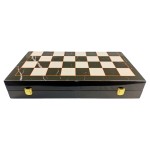 Gilded ebony and bordered marble patterned chess set