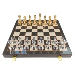 Gilded ebony and bordered marble patterned chess set